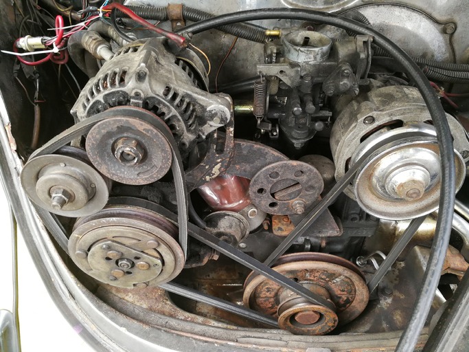 Old carburetor motor car. Motor engine broken need to repair in garage