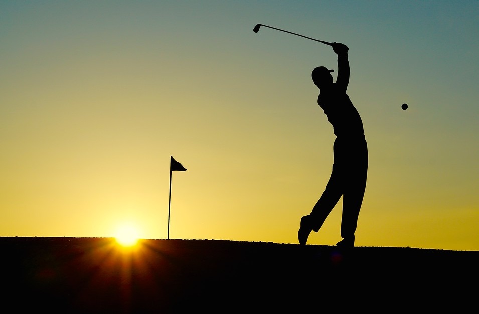 silhouette of golfer, sunset, golf course, golf club, golf ball