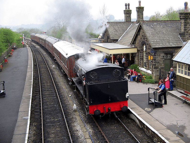 A train pulling into Embsay station on the Embsay and Bolton Abbey Steam Railway.