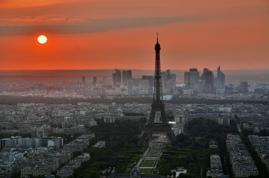 the Eiffel tower and the skyscrapers in France on a sunset view