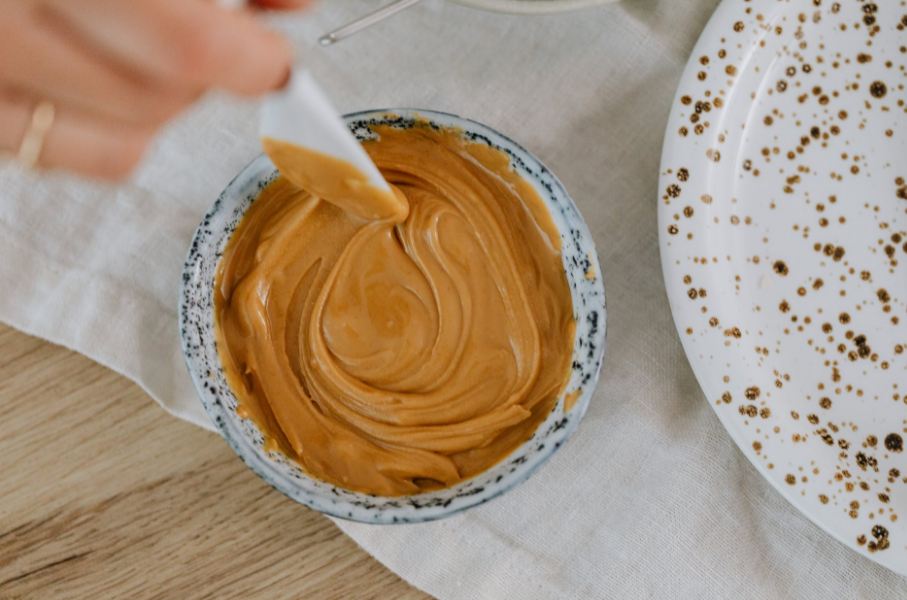 A photo of peanut butter in a bowl