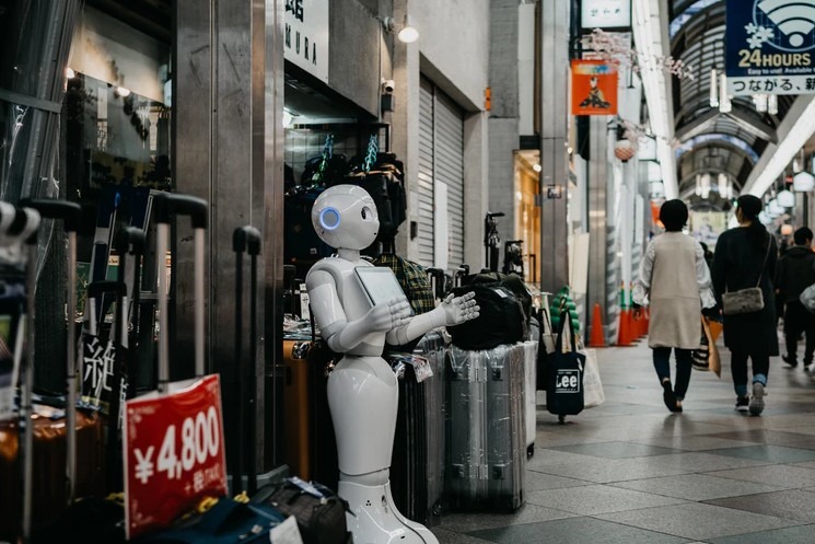 A robot standing in front of a shop
