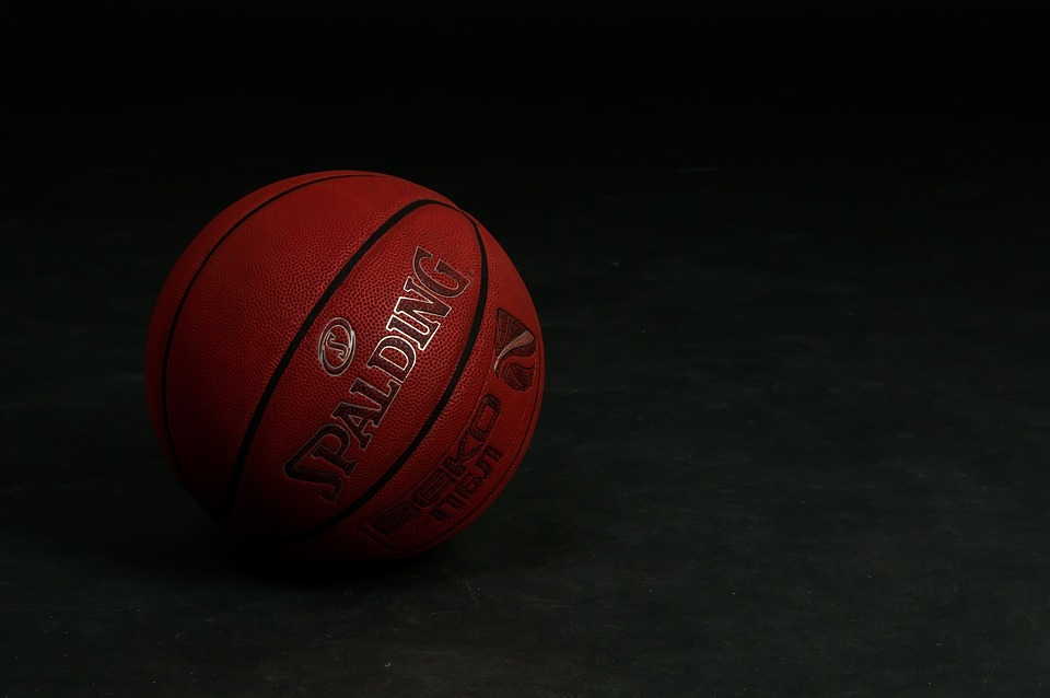 a basketball ball in black background 