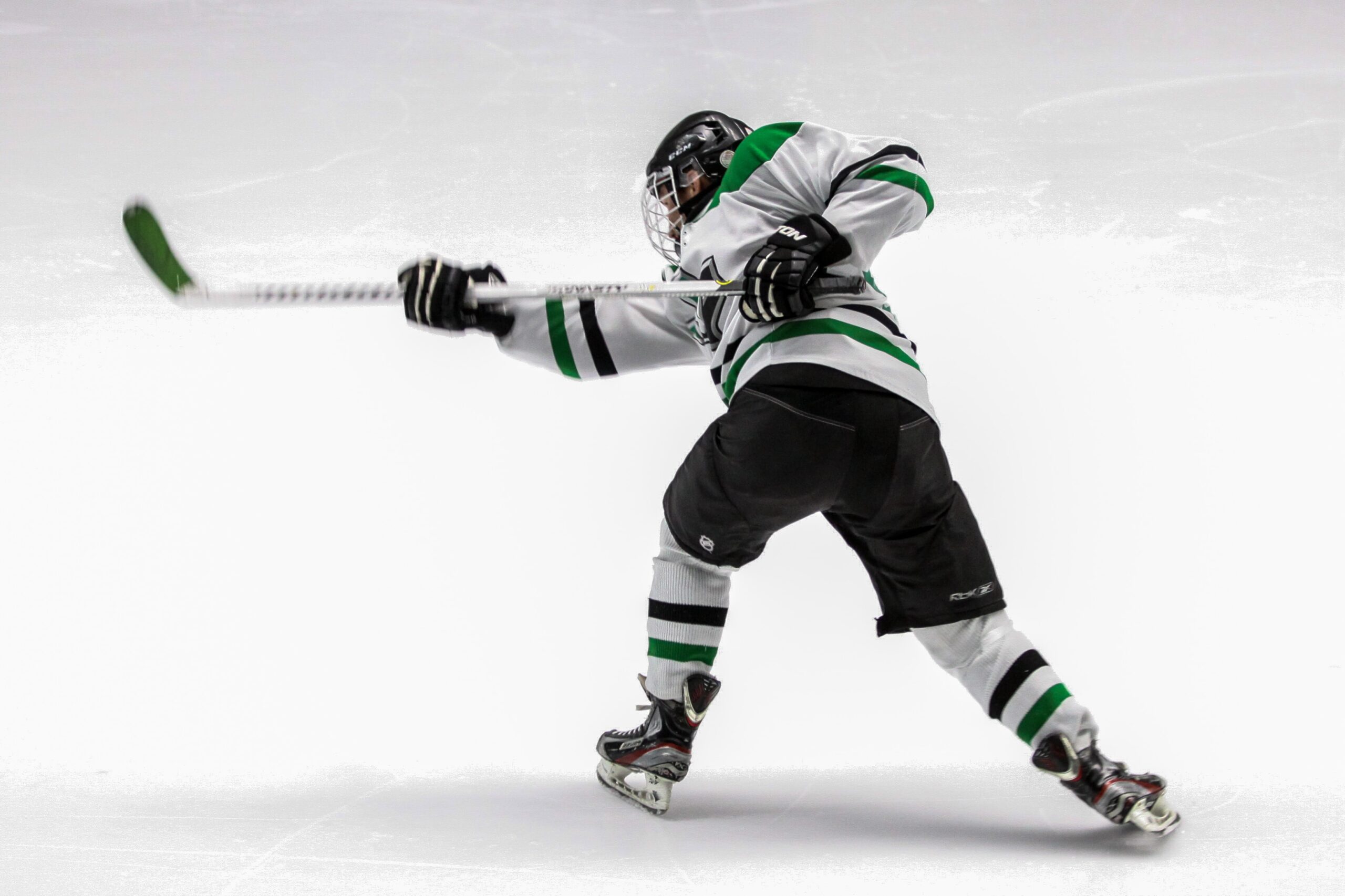 skating-sports-images-hockey-movement-action-black-pants-ice-ice-skates-hockey-stick